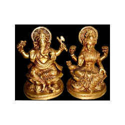 Ganesh And Laxmi Sitting On Lotus